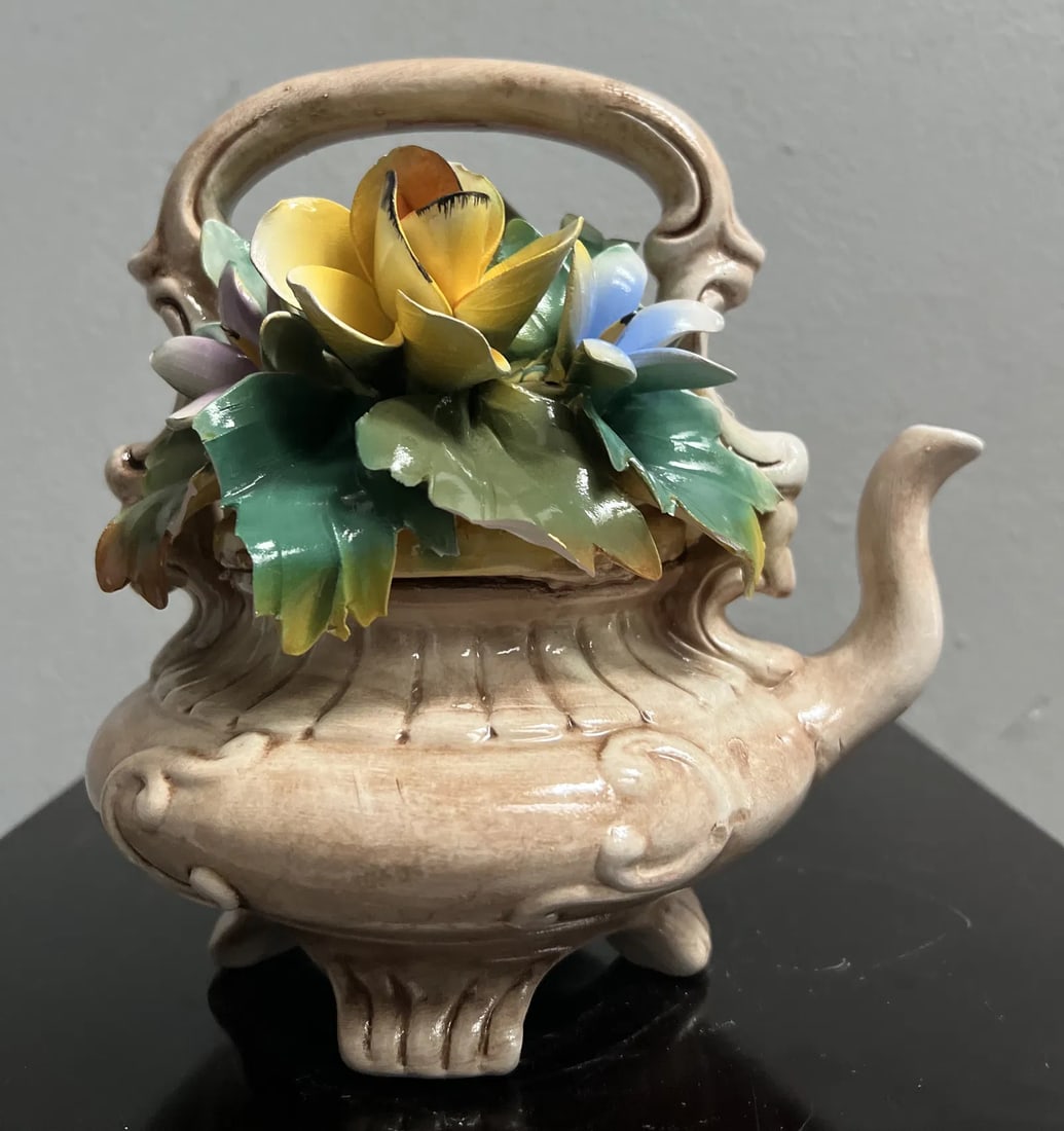 Vintage Large Italian Capodimonte Ceramic Flower Decorative Tea Pot: Crafted with meticulous attention to detail, this Vintage Large Italian Capodimonte Ceramic Flower Decorative Tea Pot is a true testament to the artistry of the mid-20th century. Its all-over pattern