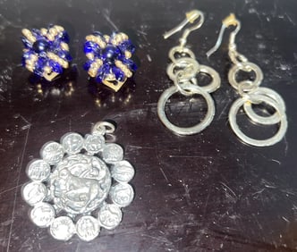 A Collection of Several Items a set of Earrings,a Cufflink set and a Capricorn medallion