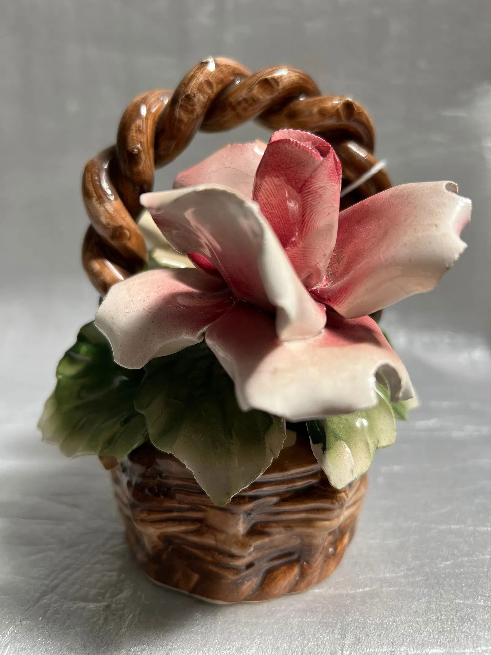 Vintage Large Italian Capodimonte Ceramic Flower Decorative statue: Enhance your space with the charm of Italian artistry. This vintage large Capodimonte ceramic flower decorative statue is a testament to the intricate craftsmanship of the mid-20th century. With its v