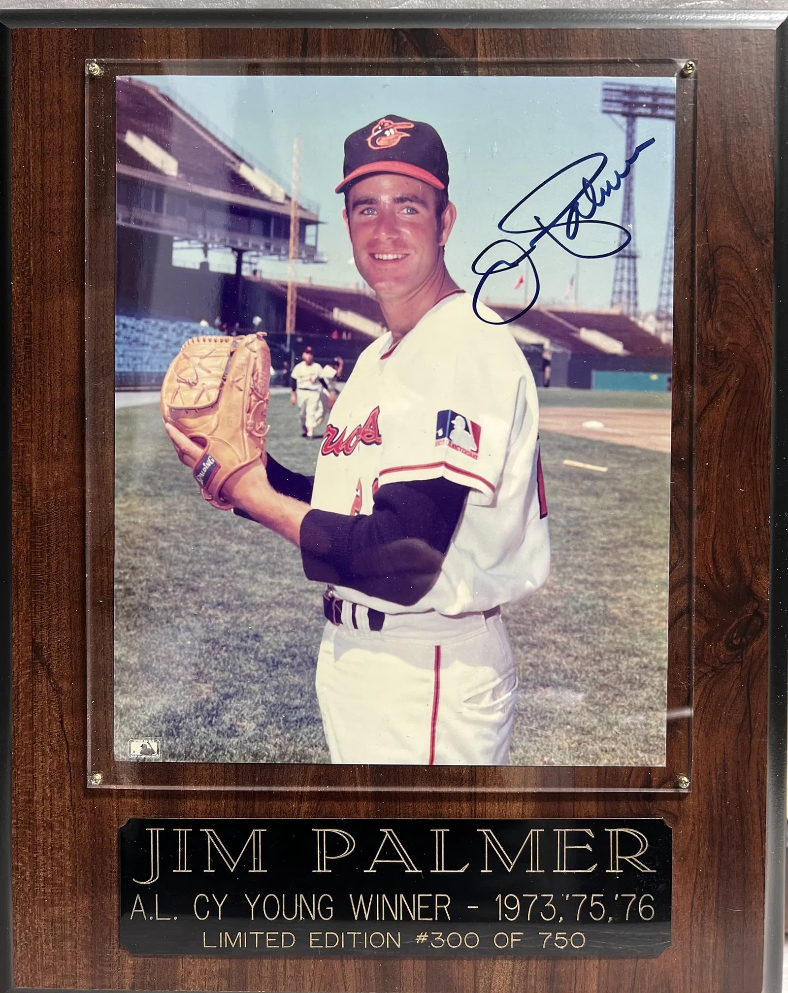Jim Palmer Autographed Cy Young Winner 1973,75,76 Limited Edition: This limited edition photo features an autograph from Jim Palmer, a Cy Young award winner for the Baltimore Orioles in 1973, 1975, and 1976. The photo showcases the signature of this legendary basebal