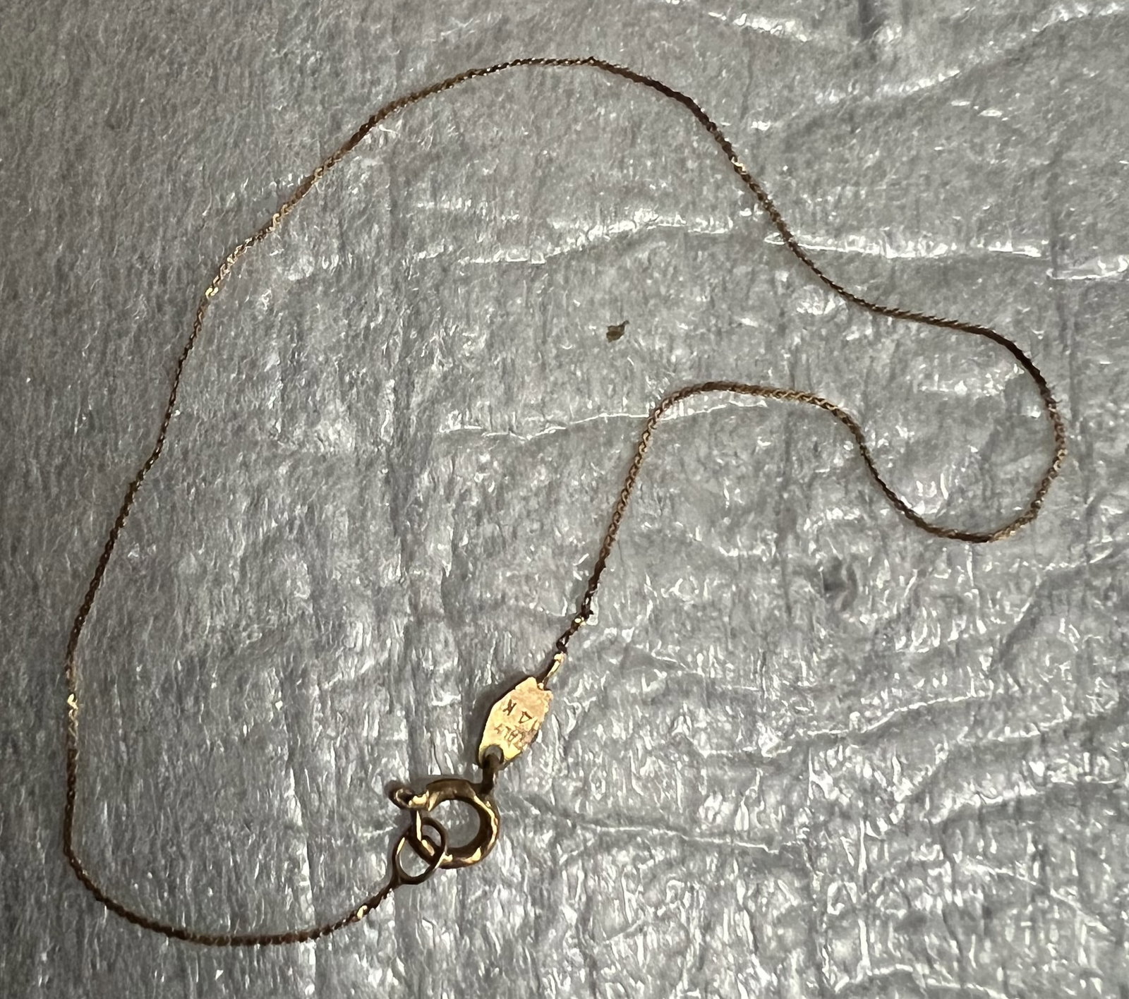 14K Gold Childs Bracelet 6": The product is a 14K gold child's bracelet measuring 6 inches in length. This fine jewelry item is designed specifically for children and features a high-quality metal purity of 14k, ensuring durabili