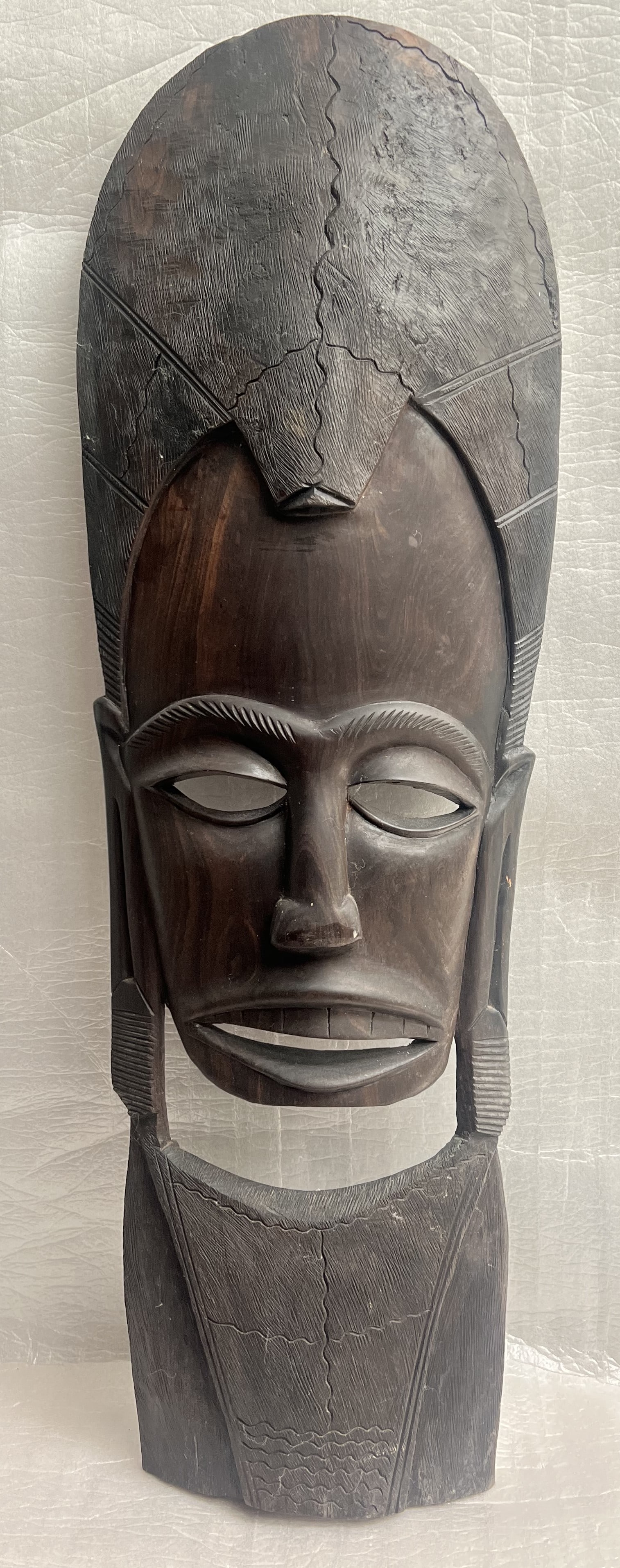 Hand Carved African Tribal Mask Made of Dark Wood: Hand Carved African Tribal Mask Made of Dark Wood 35" T x 13" W