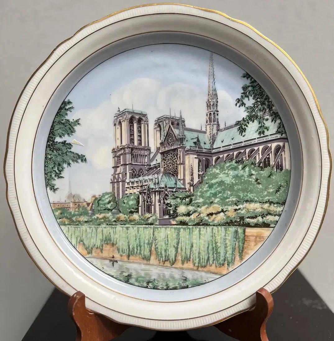 Paris "Notre Dame" France Hand Painted Display Plate Dated 1949 Germany US Zone: This exquisite collector plate features a beautiful hand-painted image of the iconic Paris cathedral, "Notre Dame," on round porcelain. The plate was produced in Germany during the mid-20th century, s