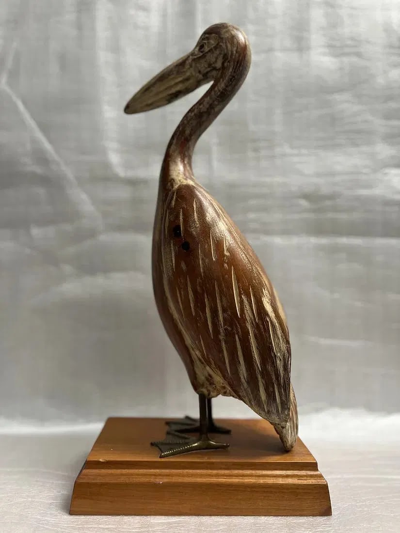 MID CENTURY MODERN METAL AND WOOD IBIS BIRD SCULPTURE 21" TALL 10 " WIDE: This stunning Mid Century Modern sculpture depicts an Ibis bird in exquisite detail and is crafted from metal and wood. The piece stands at an impressive 21" tall and measures 10" in width, making it 