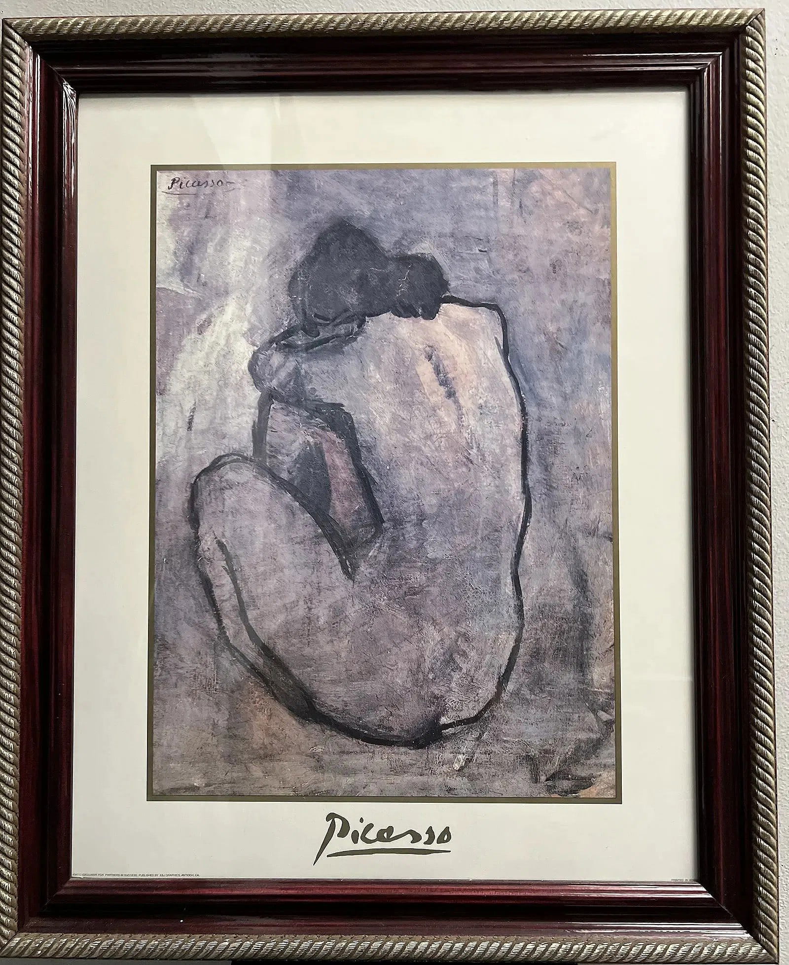 Blue Nude "Femme nue 11" by Pablo Picasso , signed upper Left Framed: This exquisite piece by Pablo Picasso titled "Femme nue 11" is a stunning lithograph print that is sure to impress any art lover. The portrait is signed by the artist and comes framed in a beautiful b