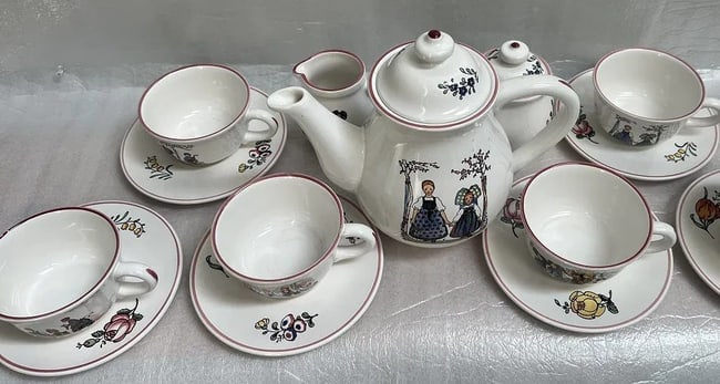 "HANSI" 14 Piece Tea Serving Set , Kettle, 5 Cups ,Saucers, Sugar & Milk Pitcher: This 14 piece tea serving set by Hansi is a beautiful addition to any tea lover's collection. The set includes a kettle, 5 cups, saucers, sugar and milk pitcher. Each piece is made of high-quality cer