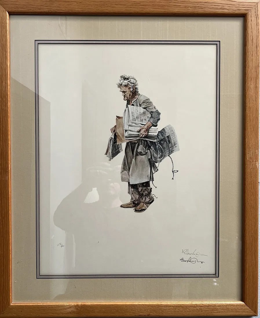 LARGE LITHOGRAPH HAND SIGNED IN PENCIL BY THE ARTIST: This stunning art piece portrays a woman carrying her papers. It is a large, hand-signed lithograph on paper that has been matted and framed, making it ready to display. The print is an original and c