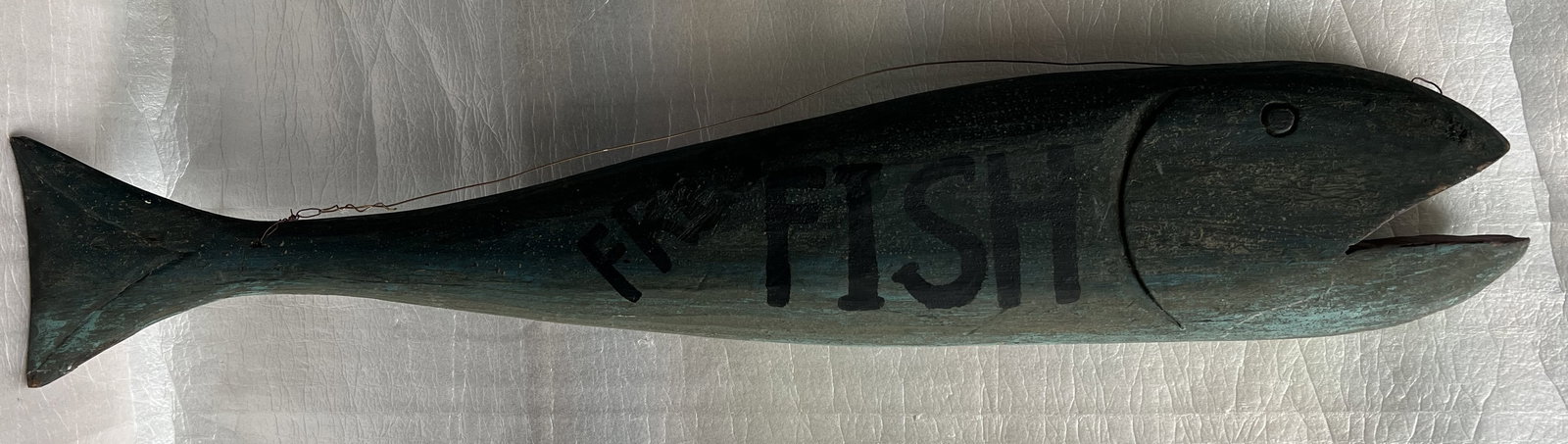 Vintage Hand-Carved Wooden Fish “Bar” Sign: This is a vintage wooden advertising sign shaped like a fish, likely used for a seafood restaurant, bait shop, or coastal bar. The sign is carved and hand-painted, giving it a rustic, nautical charm.V