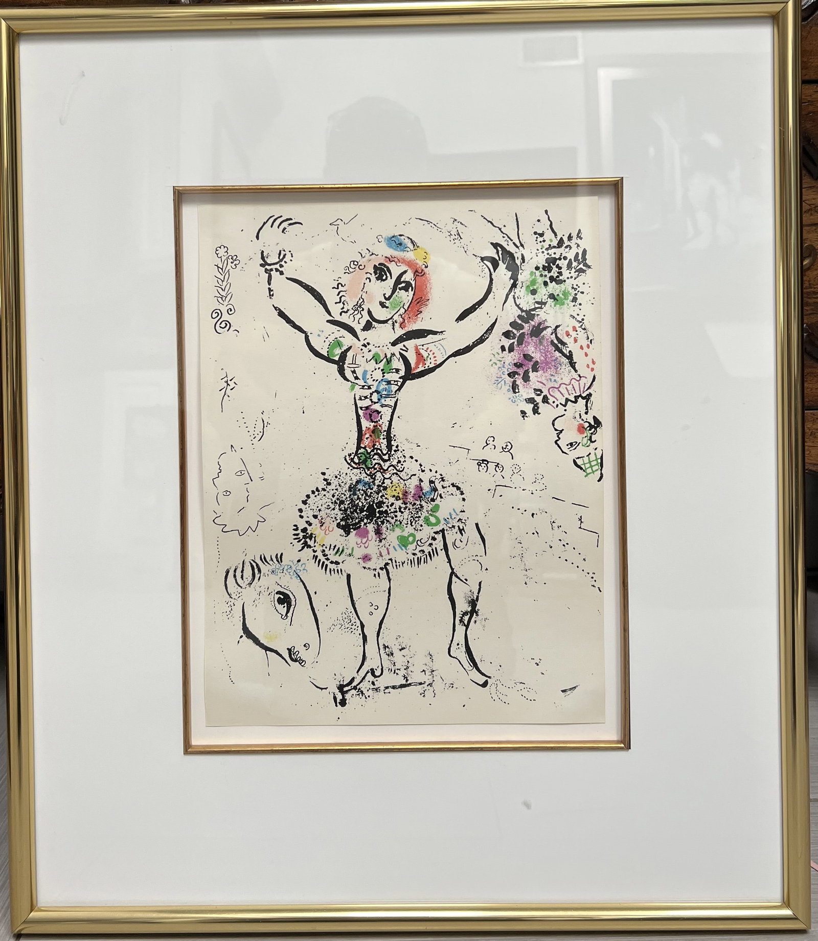 Marc Chagall "Woman Juggler" original lithograph in colors on wove paper: The image displays an original color lithograph by Marc Chagall, titled "Woman Juggler" (also known as "The Juggler" or "La Jongleuse"), created in 1960. The artwork is an original lithograph in color