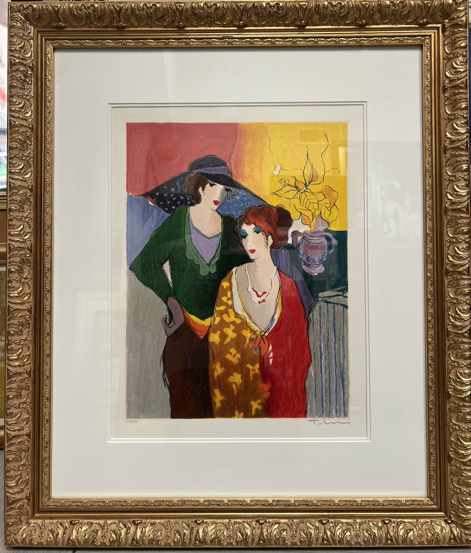 Itzchak Tarkay (1935-2012) Limited Edition Numbered Framed Hand Signed Print: Artist proof serigraph by the Israeli artist Itzchak Tarkay (1935-2012). It depicts two women in an interior scene, a subject common in the artist's work. DescriptionStyle and Influence: The artwork i