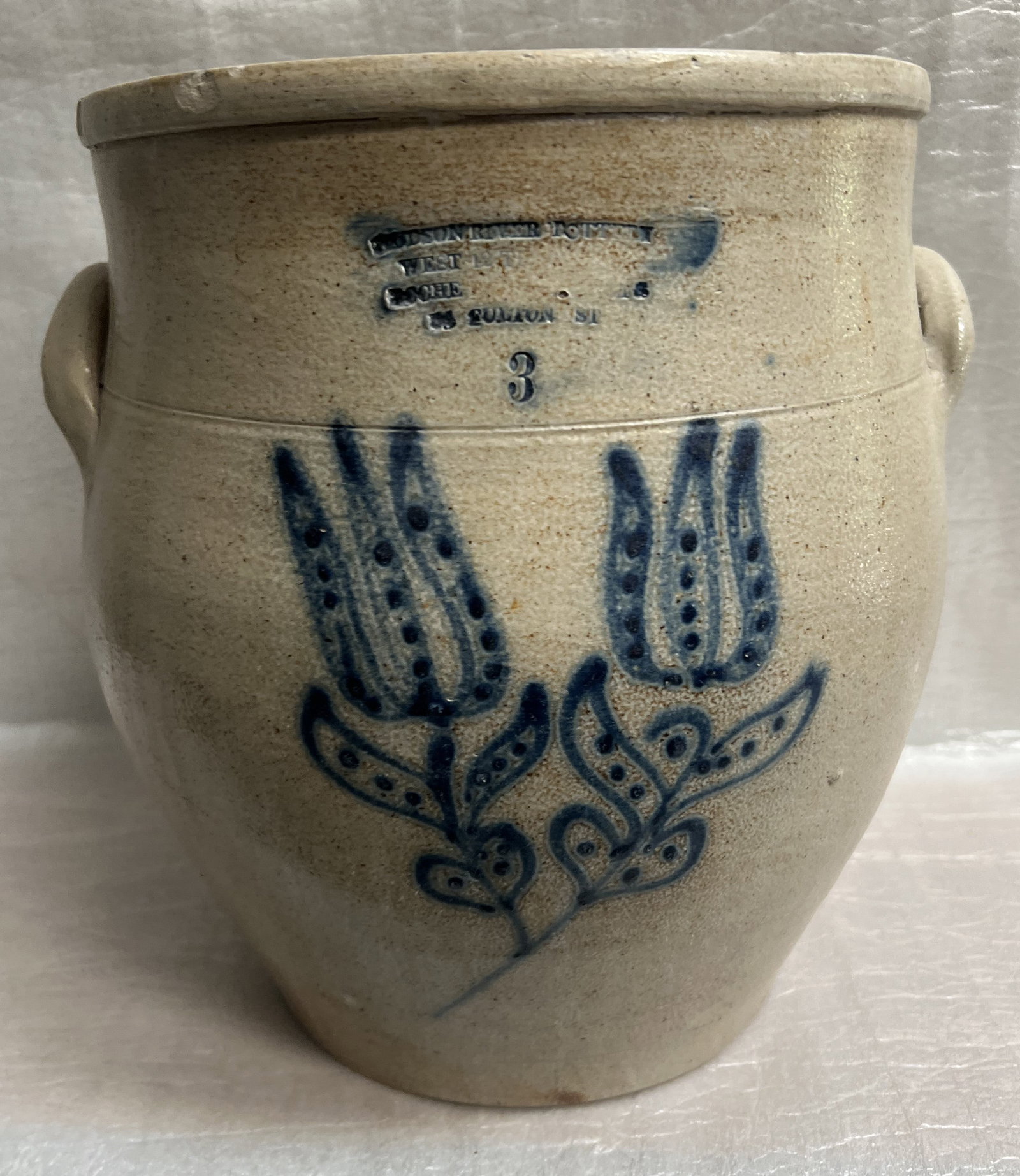 Vintage American Stoneware Crock , Mid 19th Century Hudson River Pottery: The image displays a vintage American stoneware crock, likely dating to the mid-19th century. Stoneware crocks were historically used for storing perishable food items like butter, salted meats, and p