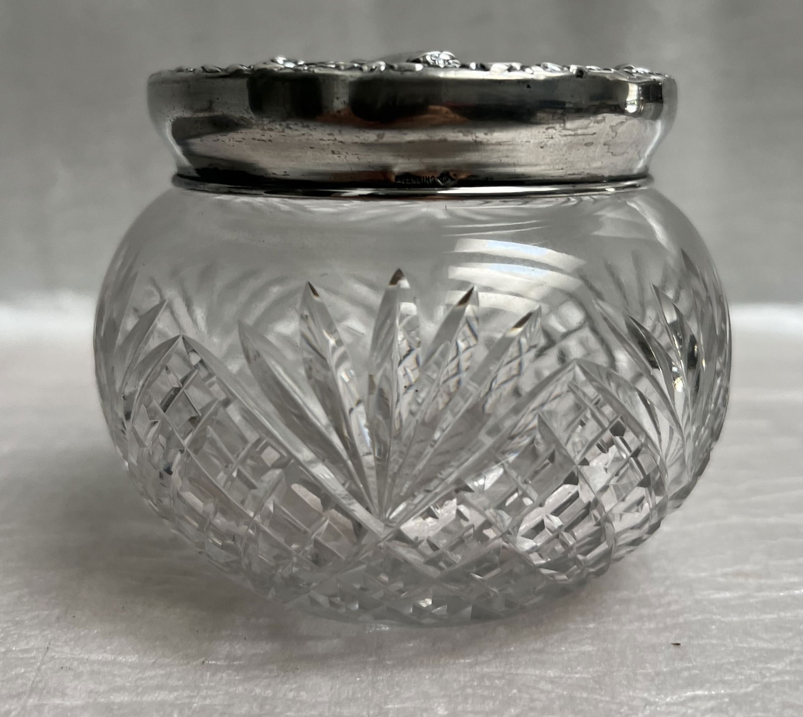 Vintage Cut Glass Vanity Jar with a Sterling Silver Lid , Sterling .74 oz: This item is a vintage or antique cut glass vanity jar with a sterling silver lid. DescriptionPurpose: These types of jars were commonly used as dresser or powder jars to hold cosmetics, creams, or sm