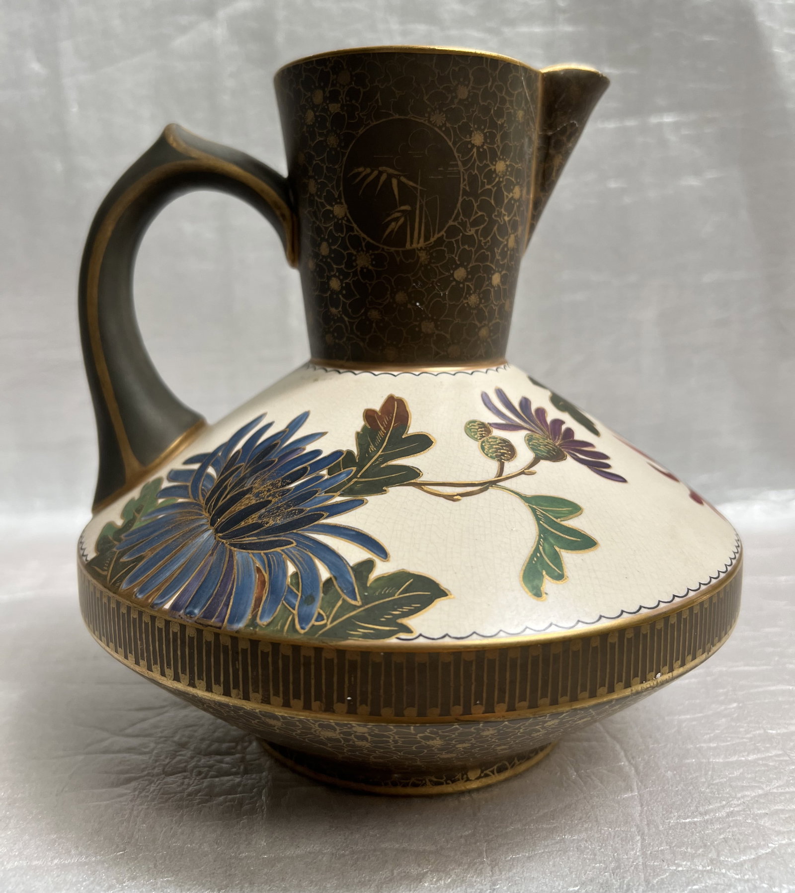 Doulton Burslem Slaters Patent Chine - Gilt Pitcher: The item pictured is a Doulton Burslem Slater's Patent chine-gilt pitcher or jug. This specific type of ceramic ware is known for its unique decorative technique and aesthetic movement style. Decorati
