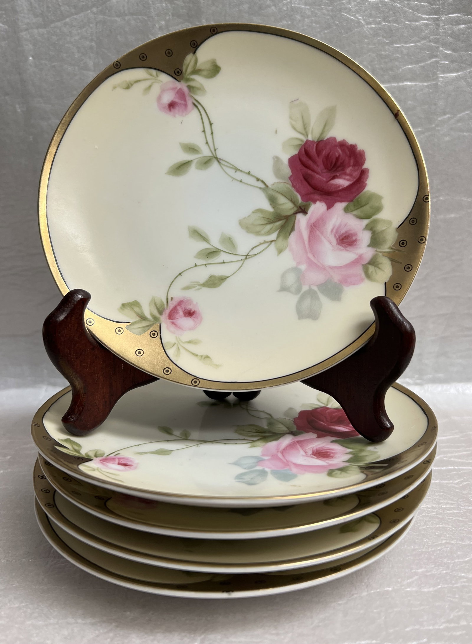 Set of 5 Plates MW co (Mitchell Woodbury Company) Hand Painted Porcelian Plates from Bavaria: This set of five plates are MW Co. (Mitchell Woodbury Company) hand-painted porcelain plates from Bavaria, Germany, featuring a rose pattern and gold trim . DetailsManufacturer: The plates were made f