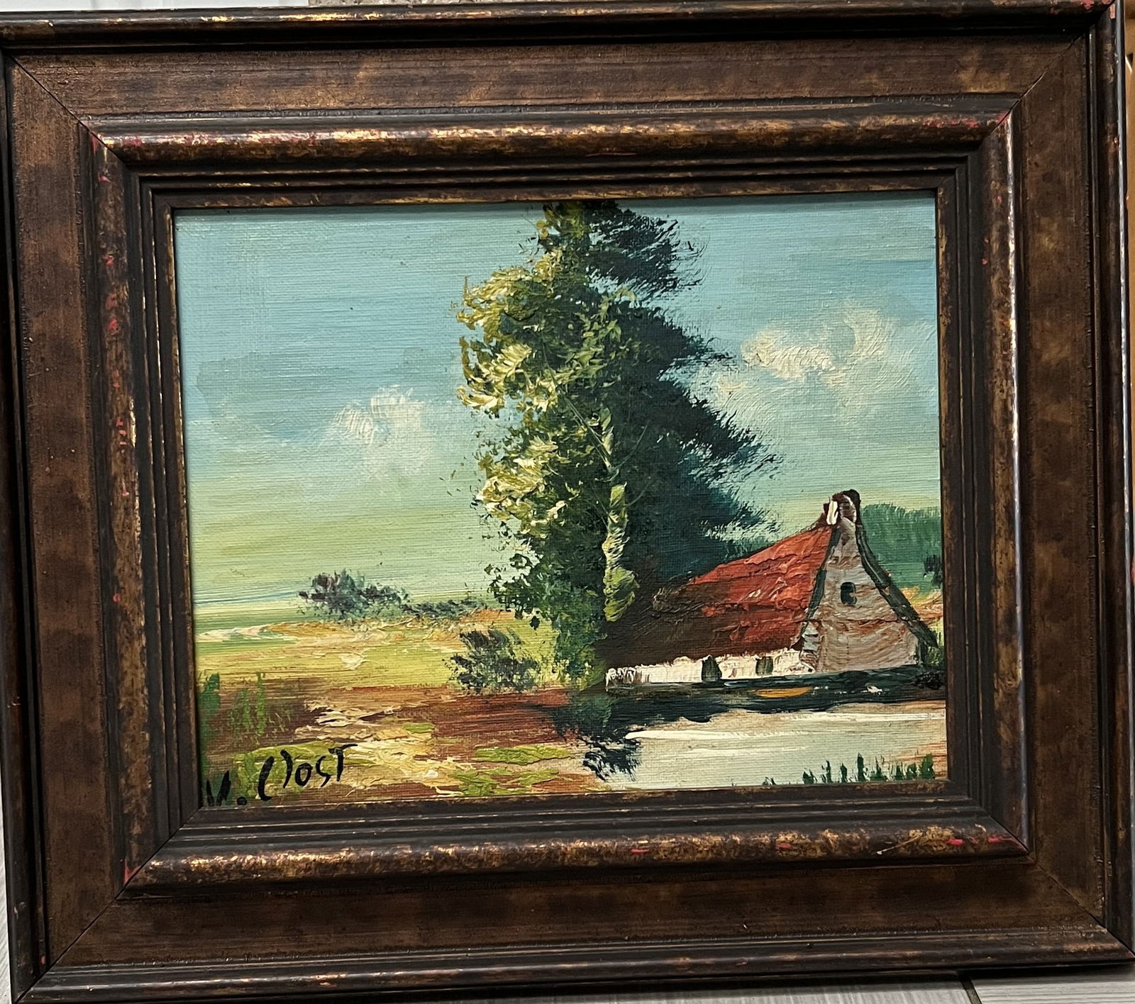 V. Oost Original Oil on Board - European Cottage Landscape - 14” x 12” Signed: OverviewThis charming oil painting on board captures a peaceful rural scene in an impressionistic style. The artist, V. Oost, utilizes a muted, natural color palette of greens, ochre, and soft greys t