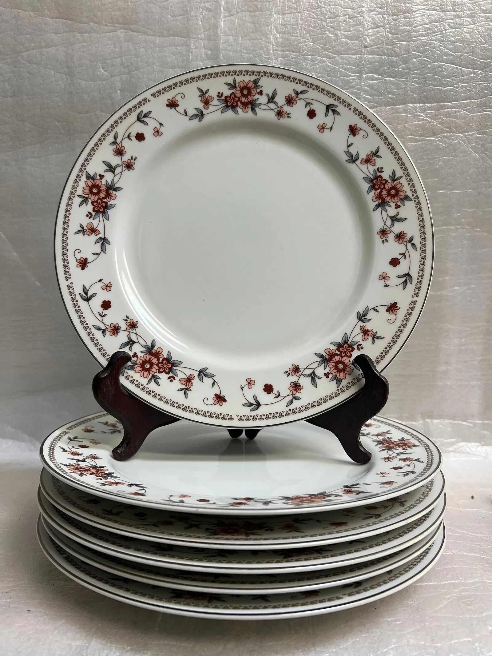 Set of 6 Sheffield Anniversary Porcelain Fine China Dinner Plates 10": Set of 6 Sheffield Anniversary Porcelain Fine China Dinner Plates 10"characterized by its floral pattern with peach/pink and rust-colored flowers, gray/blue leaves, and a silver rim. The pattern is ca