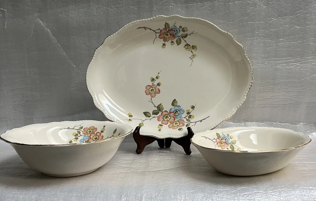 Set of 3 Vintage Homer Laughlin China Company, Serving Dishes Mid Century: Set of 8 Vintage Homer Laughlin China Company, Serving Dishes likely in the Virginia Rose shape, featuring a floral pattern that resembles apple blossoms or a similar delicate floral design, possibly