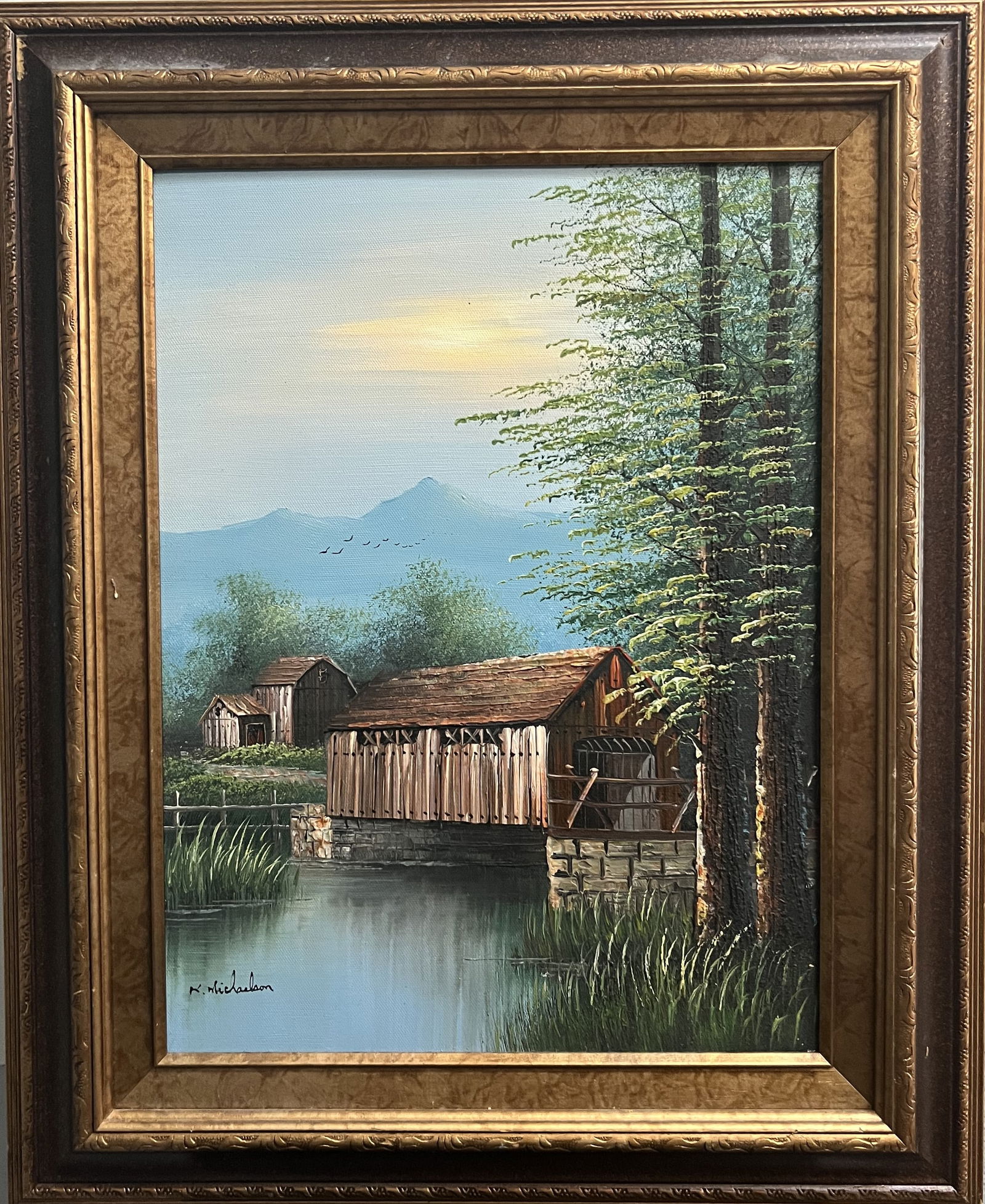 Vintage Ken Michaelson Original Oil Painting "Summer Serenity" Covered Bridge & Grist Mill Landscap: This is a beautiful, original vintage oil painting on canvas by the American landscape artist Ken Michaelson. A master of capturing the tranquil essence of rural life, Michaelson depicts a quintessent