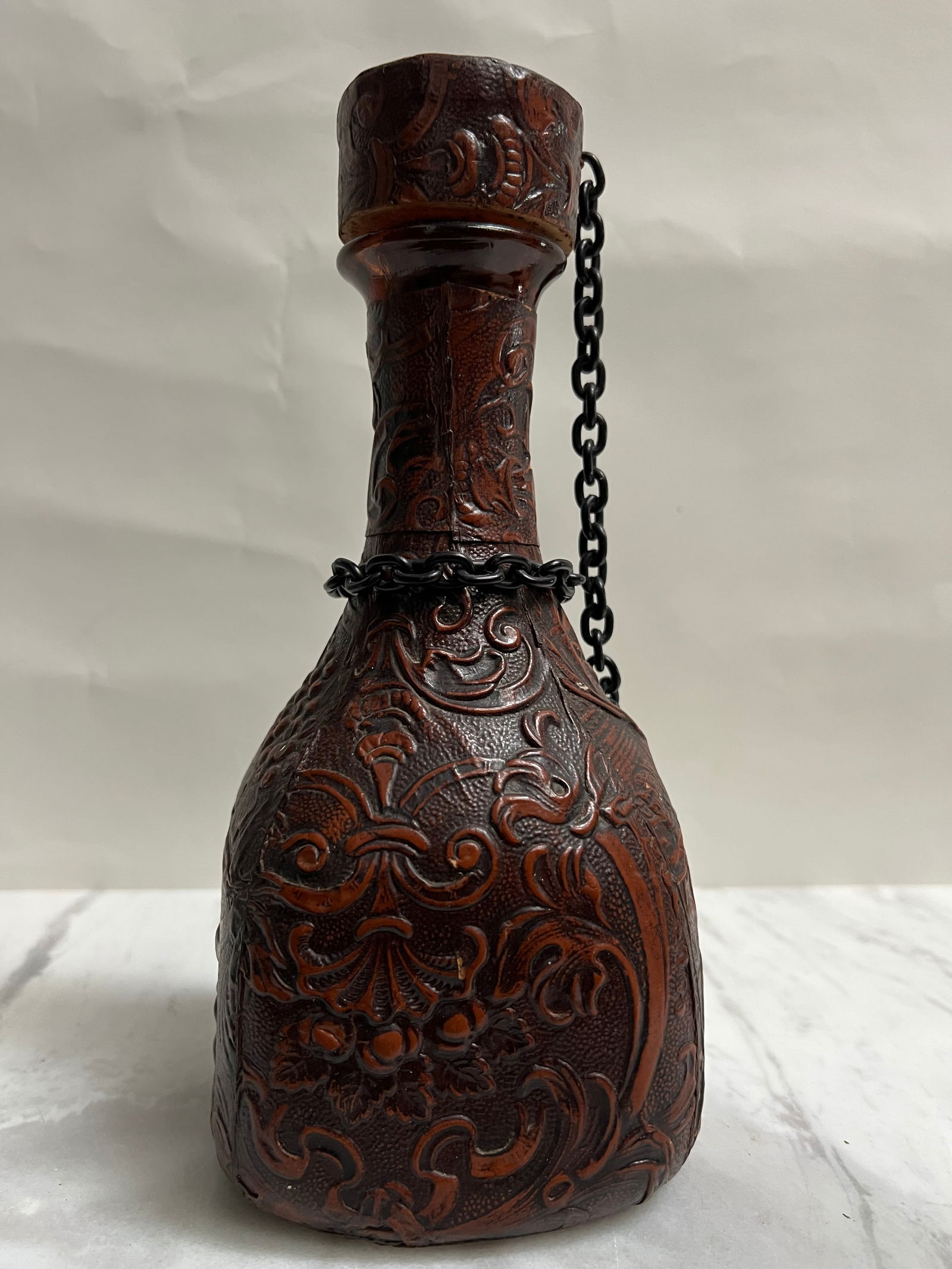 vintage-style leather-wrapped glass decanter, likely produced in Italy (1 of 3)