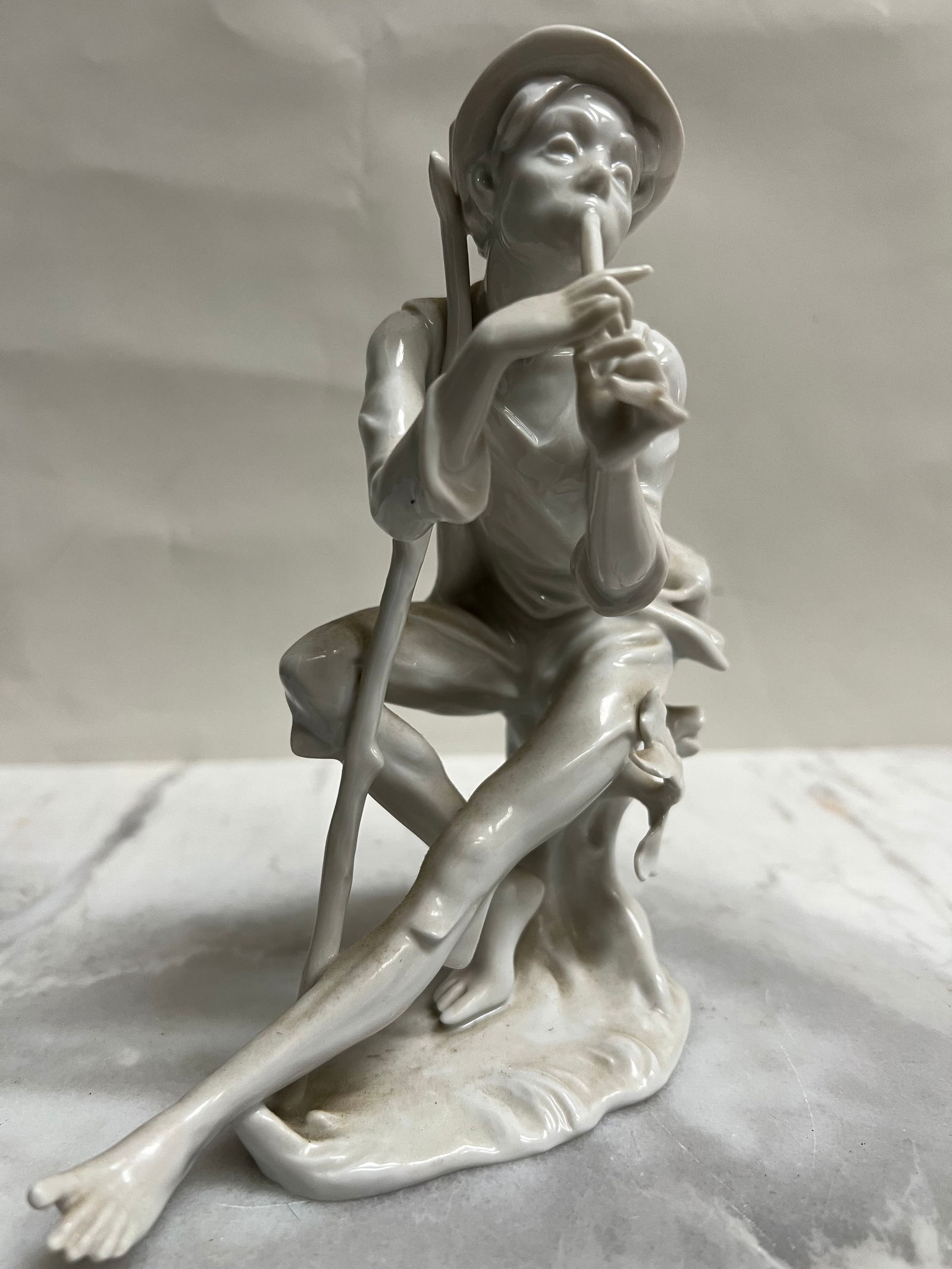 Vintage Alka Kunst Bavaria Porcelain Figurine - Seated Shepherd Boy with Flute #394: This statue is a vintage porcelain figurine manufactured by Alka Kunst (Alboth & Kaiser) in Bavaria, Western Germany.Description• Subject: The figurine depicts a seated shepherd boy or young man
