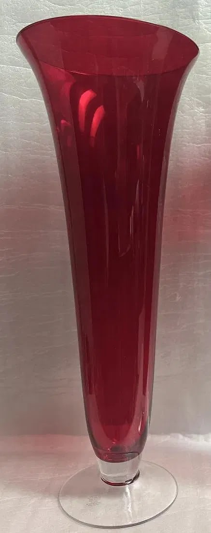 STUDIO ART GLASS RUBY RED BUD VASE HAND BLOWN ART FLUTE VASE: art glass ruby red bud vases are a stunning addition to any collection. The hand blown flute vase features an abstract art design with a vintage touch. The vase stands at 24 inches tall and 9 inches w