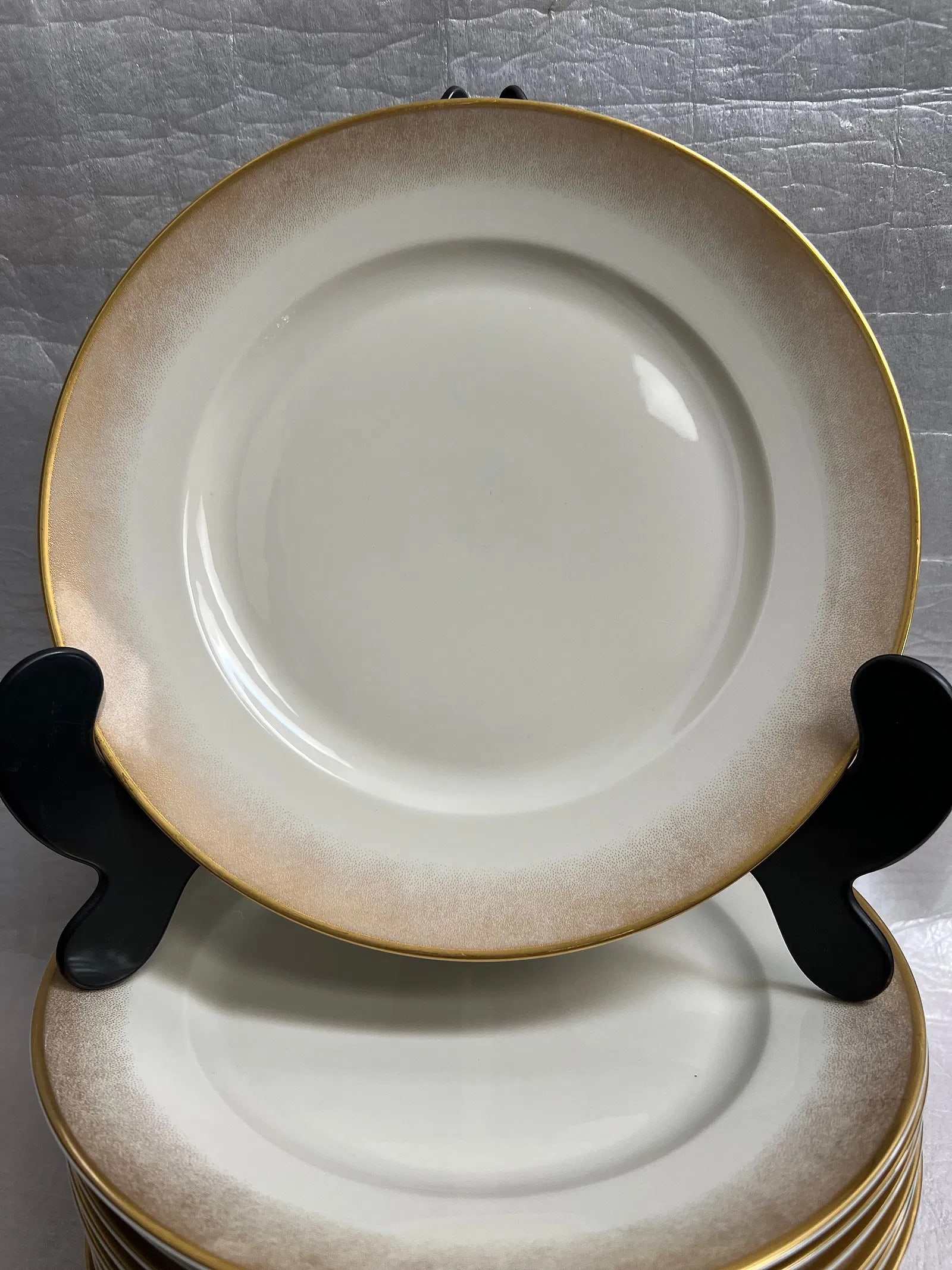 Vintage Rosenthal Continental "Golden Radiance" 10" Dinner Plates set of 12: Design & Pattern: These plates feature a wide, sophisticated ombré rim that transitions from a speckled, earthy brown into a luminous, metallic gold edge.• Aesthetic: The pattern, often attribut