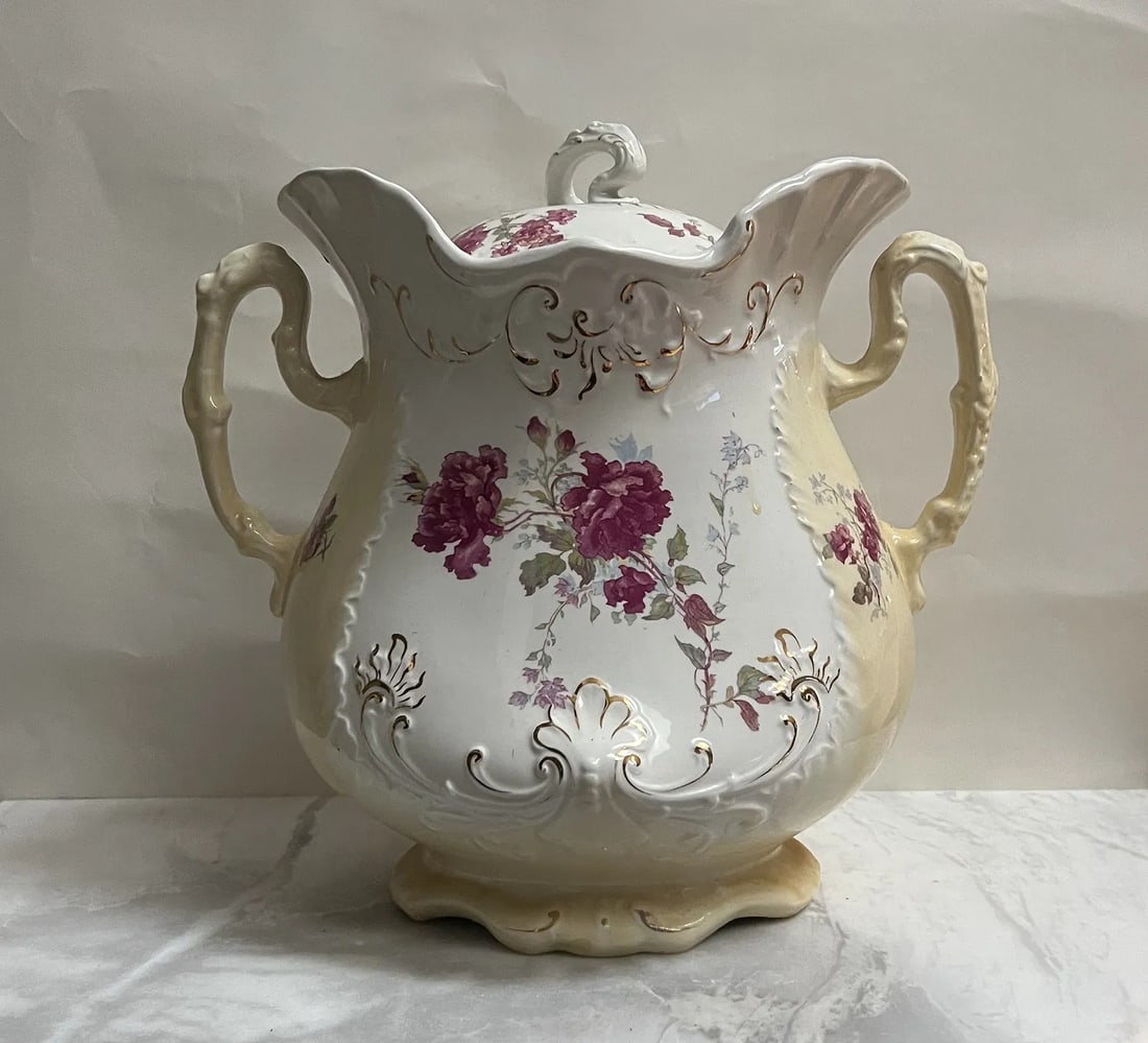Oversized Victorian Lidded Jar - 13x13 - Royal Semi-Porcelain Johnson Bros England: OverviewProduced by the renowned Johnson Bros in England, this large "Royal Semi-Porcelain" lidded jar is a masterclass in Victorian decorative arts. Measuring an impressive 13 inches tall and 13 inch