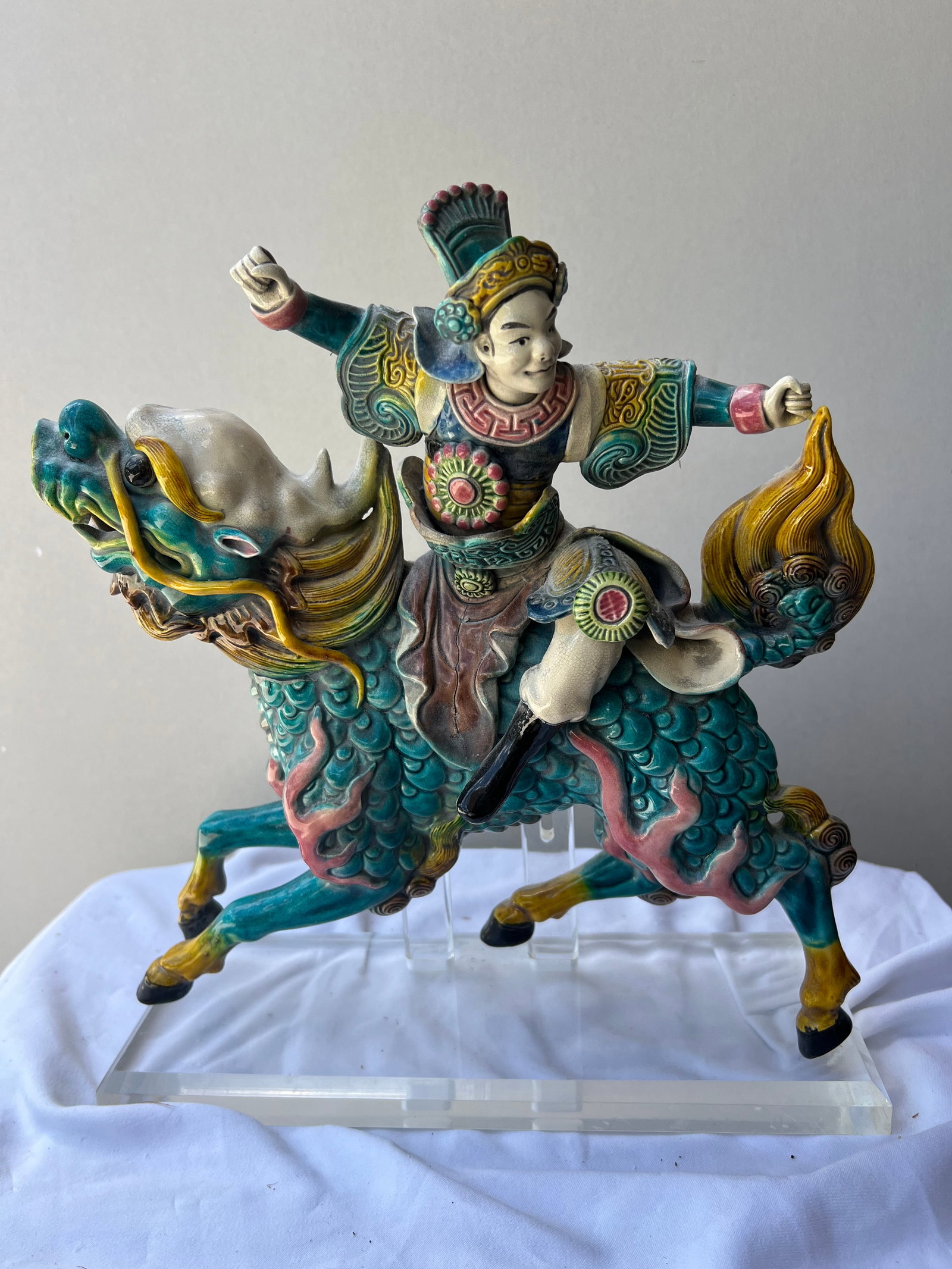 Chinese Shiwan Polychrome Glazed Pottery Figure of a Warrior (or Deity) Riding a Qilin Circa: Late (1 of 4)