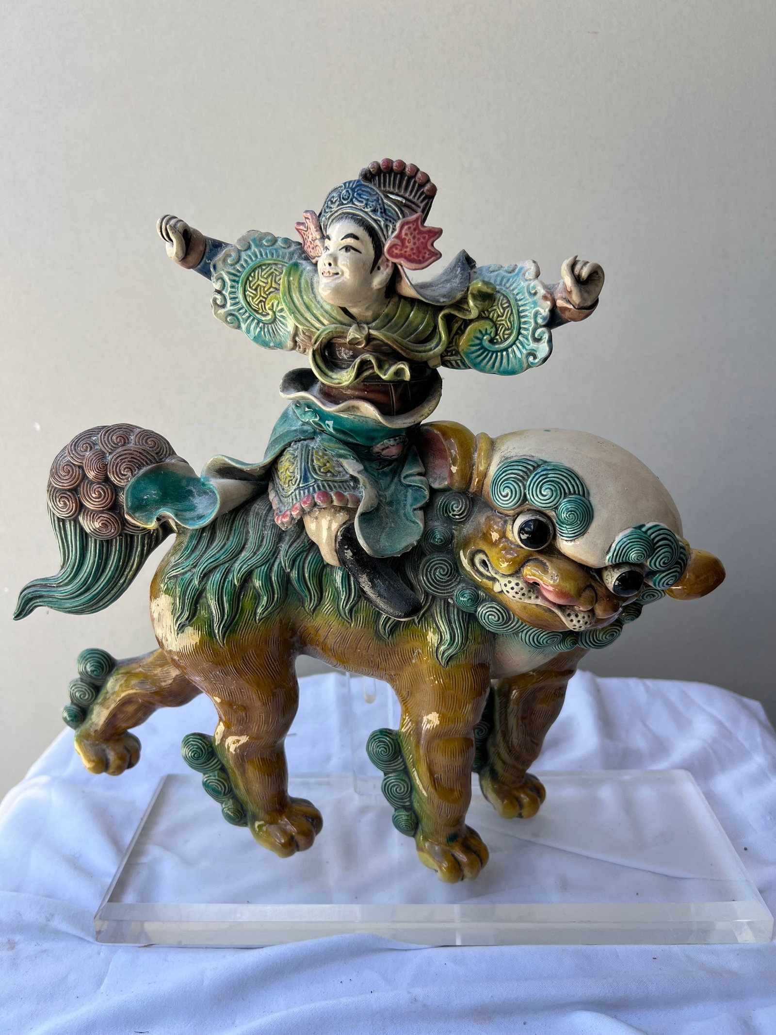 Chinese Shiwan Sancai Glazed Figurine of a Deity Riding a Buddhist Lion (Foo Dog) (1 of 5)