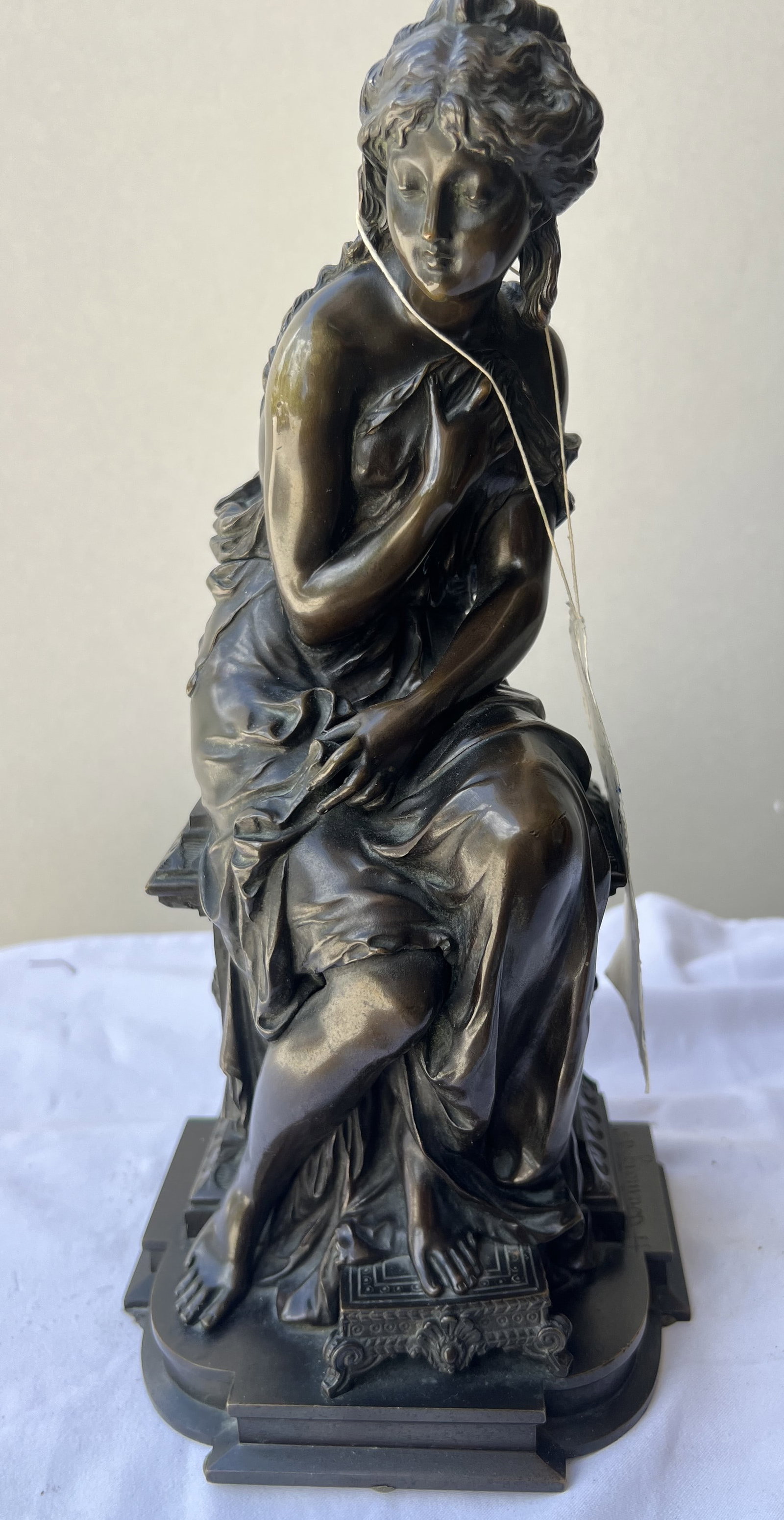 Étienne-Henri Dumaige "Classical Seated Woman" Antique French Bronze: Artist/Origin: Sculpted by the acclaimed French master Étienne-Henri Dumaige (1830–1888). Signature & Markings: The right side of the ornate base features the authentic incised signature "H. Dumaig