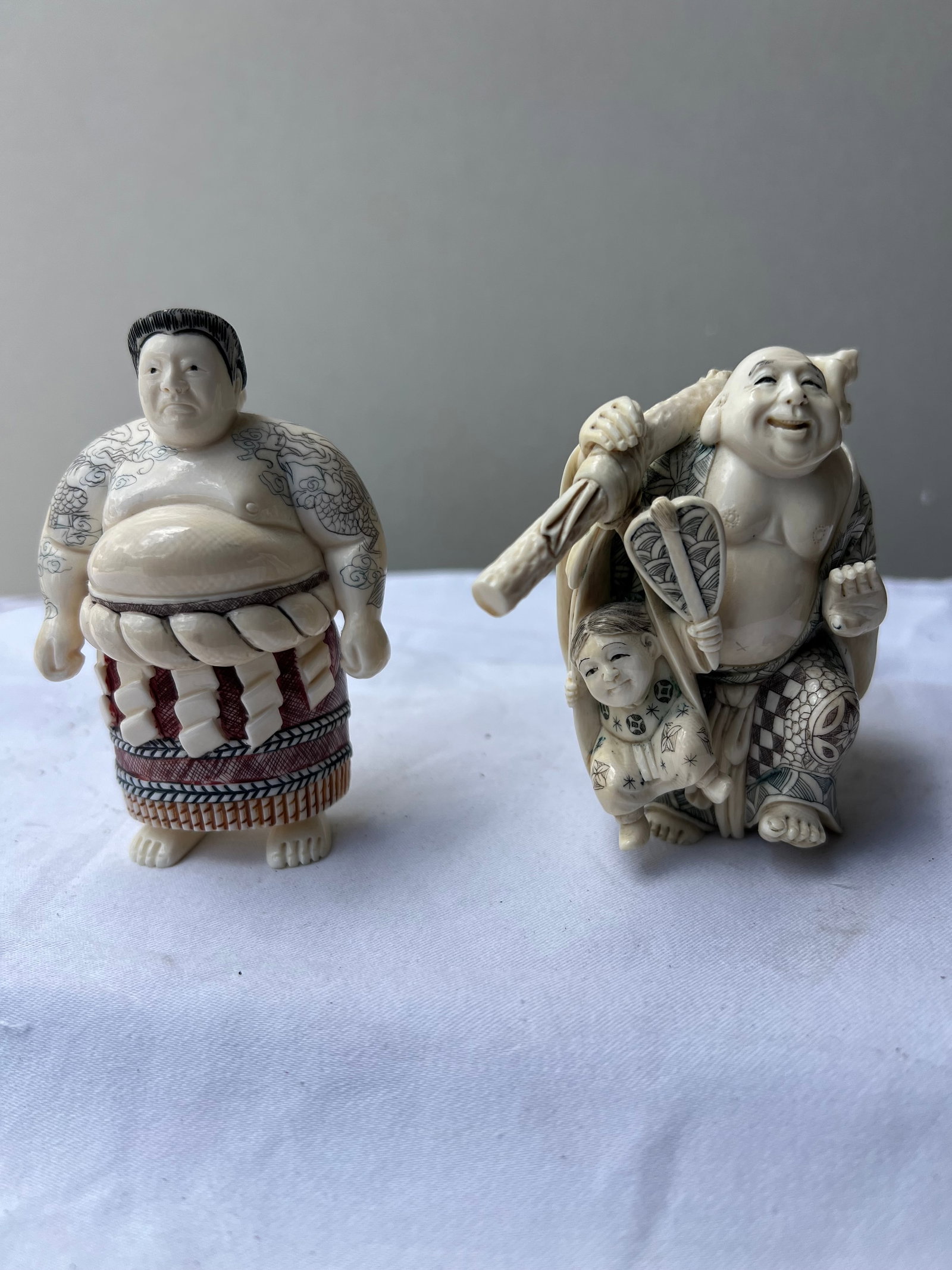 Japanese Style Polychrome Carved Bone Okimono Collection: Sumo Rikishi, Hotei with Child, and Accent (1 of 5)