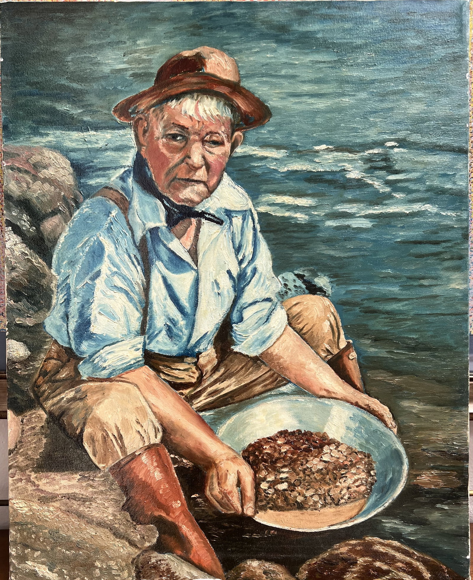 Vintage Oil Painting Gold Panner Prospector Portrait by Art Krug - 20x16 Unframed: Subject: Character study portrait depicting an elderly gold prospector seated by a riverbank with a gold pan full of sediment/ore. Artist: Art Krug Medium: Oil on canvas Dimensions: 20" H x 16" W Cond
