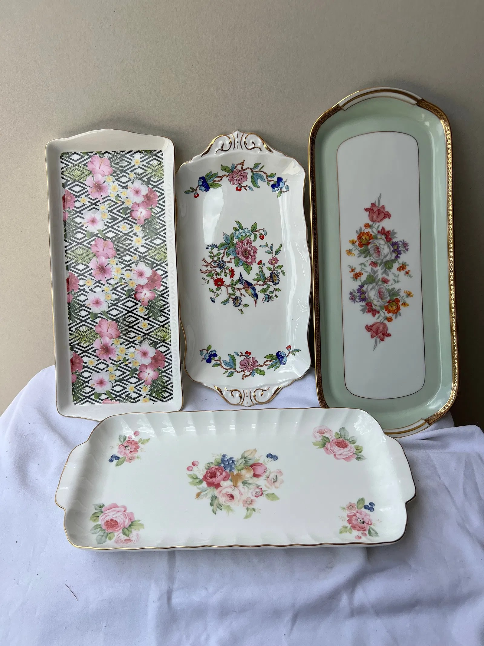 4-piece collection of rectangular porcelain sandwich and tray servers:: 4-piece collection of rectangular porcelain sandwich and tray servers:Collection Summary Total Count: 4 Pieces Common Dimensions: Approx. 15 \times 6 inches (standard long sandwich/canapé tray