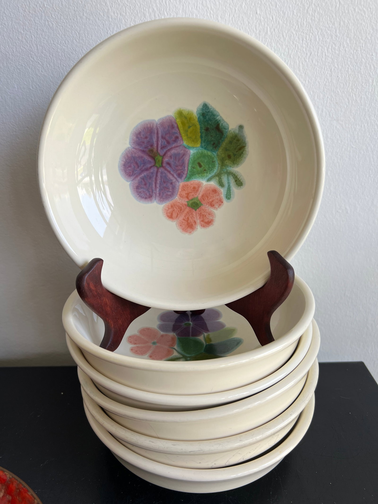 Vintage Franciscan Ware "Desert Rose" Earthenware Cereal / Soup Bowls - 7" Set of 6: This set of six 7-inch vintage Franciscan Earthenware shallow soup/cereal bowls features hand-painted floral motifs in soft shades of purple, salmon-pink, and muted green leaves set against a glossy c