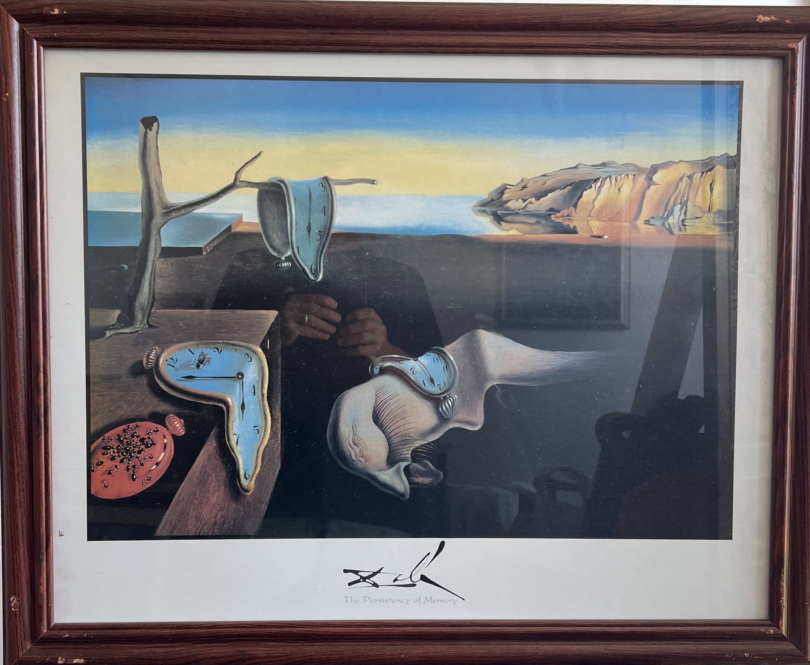 Salvador Dalí The Persistence of Memory Framed Art Print – 31" x 26: Vintage framed art print featuring Salvador Dalí’s iconic 1931 Surrealist masterpiece, The Persistence of Memory, depicting melting pocket watches set against a coastal landscape. Printed with a si