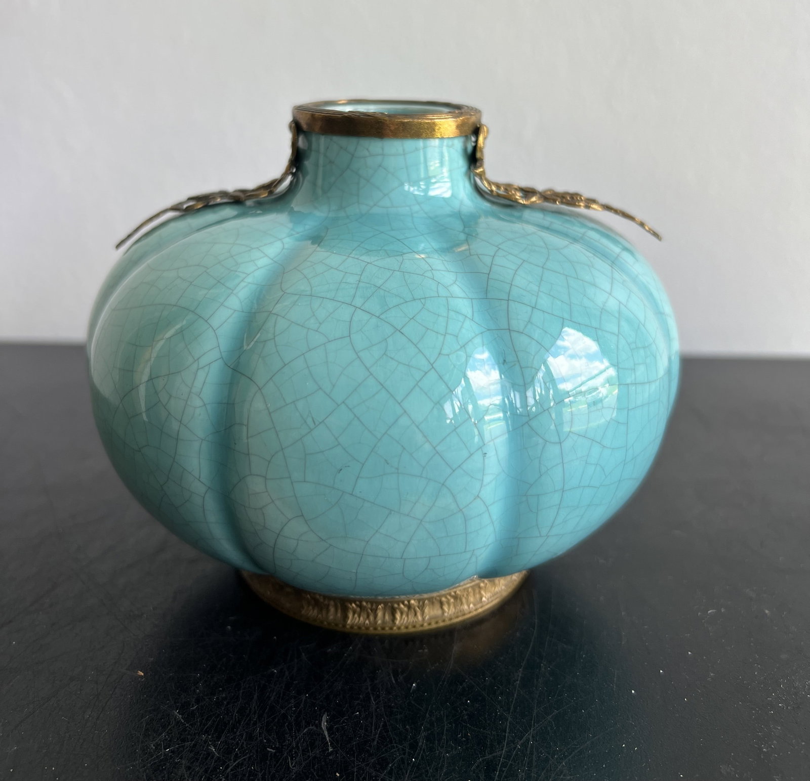 Vintage Turquoise Crackle Glaze Melon-Form Porcelain Vase with Ormolu Mounts - 6" H x 5" W: Vintage Turquoise Crackle Glaze Melon-Form Porcelain Vase with Ormolu Mounts - 6" H x 5" WDescription Form & Color: Lobed melon/pumpkin form crafted in a vivid turquoise-blue porcelain featuring a pro