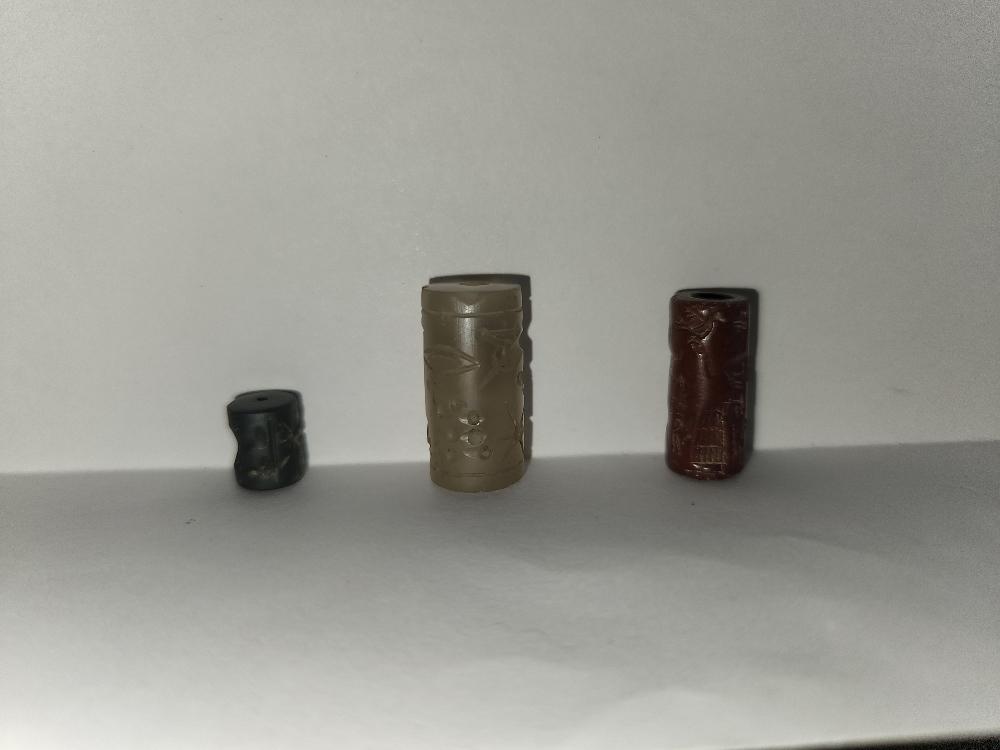 Group of Three Sumerian Cylinder Seals Carved with Human and Animal Figures (1 of 12)