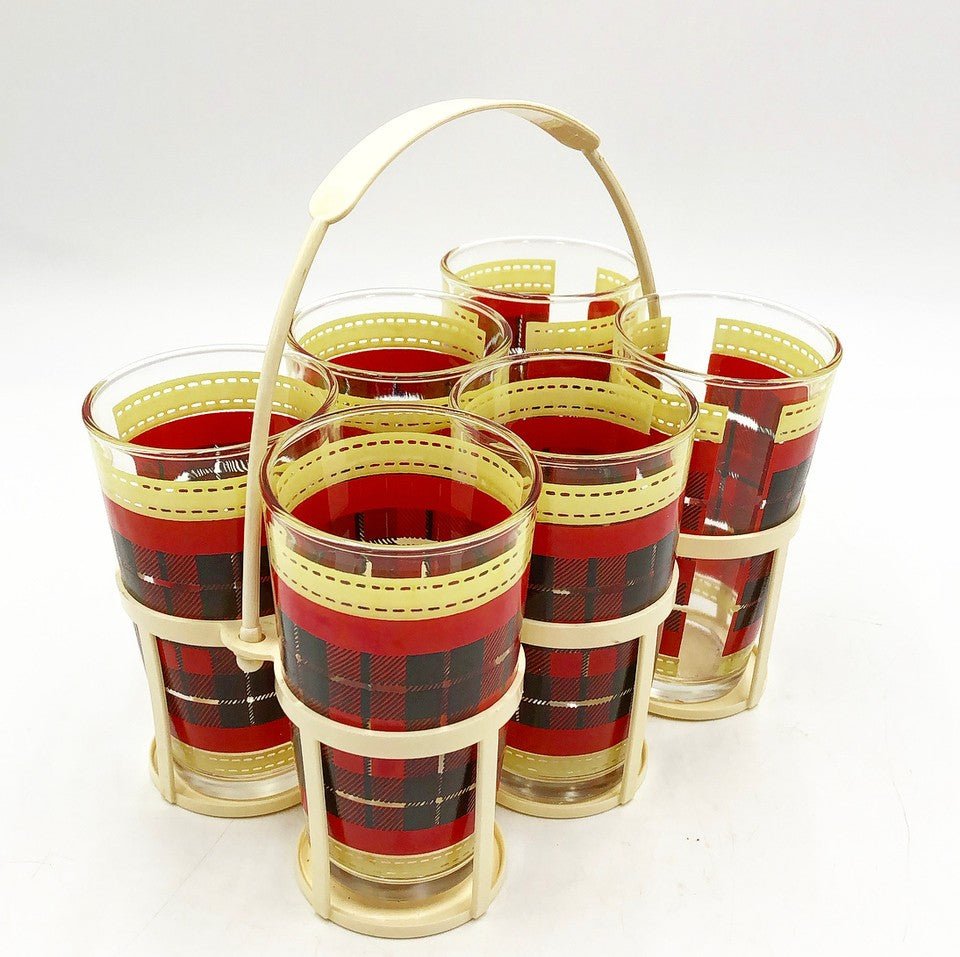 Set of 6 vintage tartan style red & black water glasses in their own original plastic carrier with h: Fabulous set of 6 vintage tartan style red & black water glasses in their own original plastic carrier with handle. From the 1960s. Great condition! These would be great for your bar during the holida