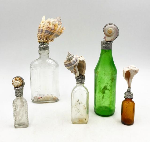 Lot set of 5 old bottles with artist shell tops. (1 of 4)