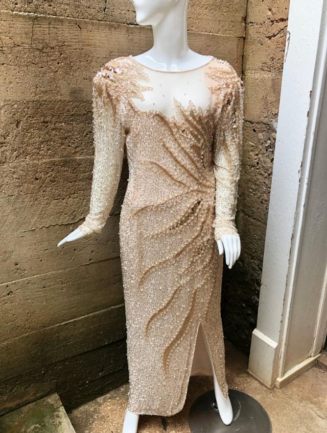 BLACKTIE by Oleg Cassini beaded womens evening gown.: BLACKTIE by Oleg Cassini beaded womenÕs evening gown. Size 12. Label in tact. Gown in good condition with no issues.