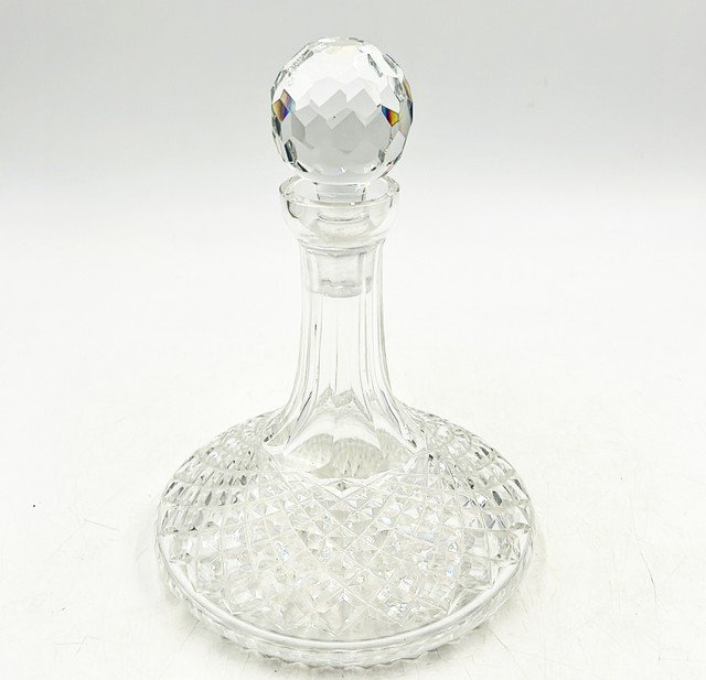 Heavy crystal cut glass decanter with top crystal glass cork. (1 of 3)
