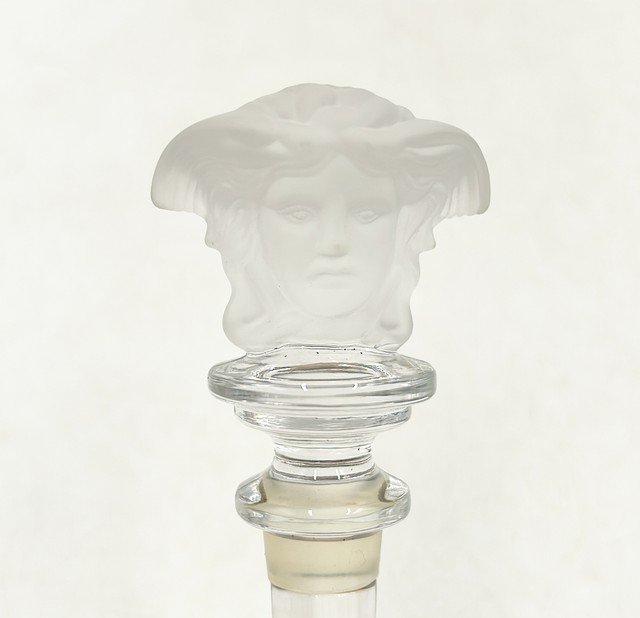 Versace Medusa head bottle stopper in glass with clear frosted top detail. (1 of 4)