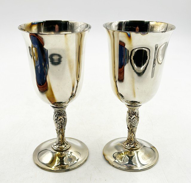 Pair of silver goblets with floral vine style carvers stem details. (1 of 4)