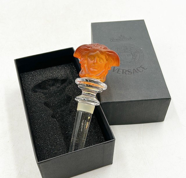 Versace Medusa head bottle stopper in glass with amber colored top detail. (1 of 4)
