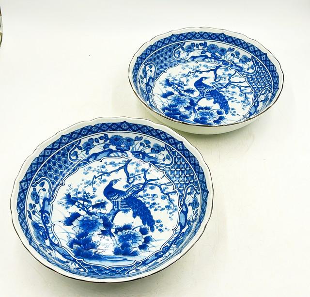 Pair of large vintage blue & white chinoiserie decorative bowls.: Pair of large vintage blue & white chinoiserie decorative bowls. Glaze painted porcelain finish. Approx 12.5 dia x 3 deep.