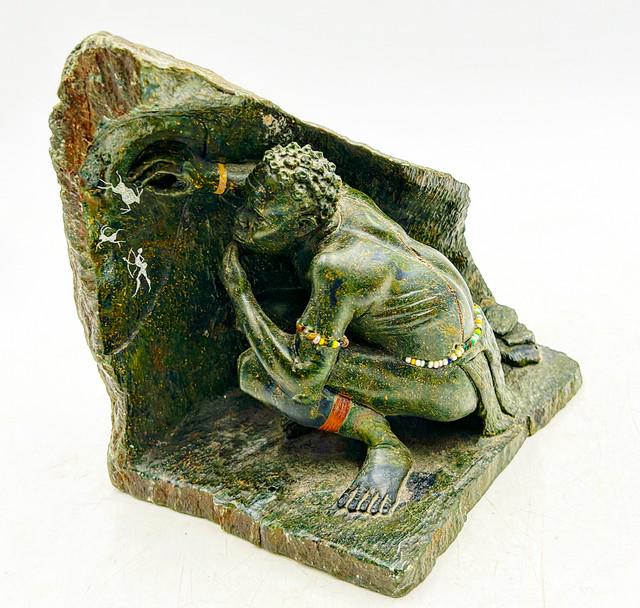 Large heavy sculpture of African man drawing on stone. (1 of 9)