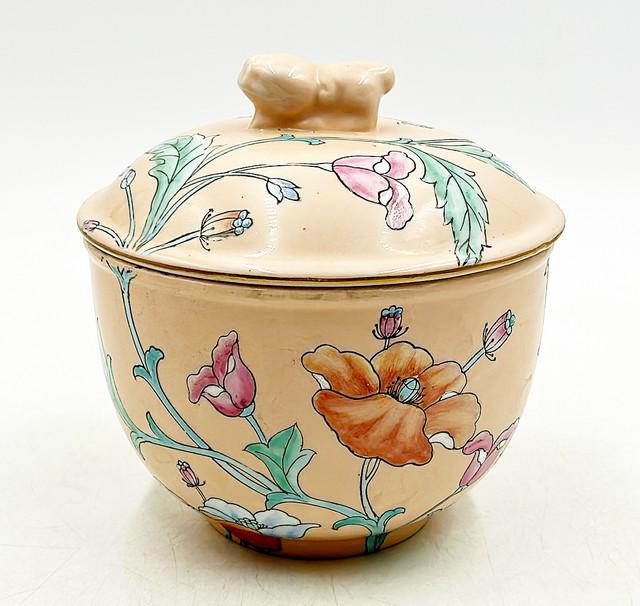 80s vintage round chinoiserie style decorative bowl with foo dog top lid detail.: 80s vintage round chinoiserie style decorative bowl with foo dog top lid detail. Glazed painted porcelain finish x stamped on base Toyo made in China. Approx 7 tall x 6.5 dia