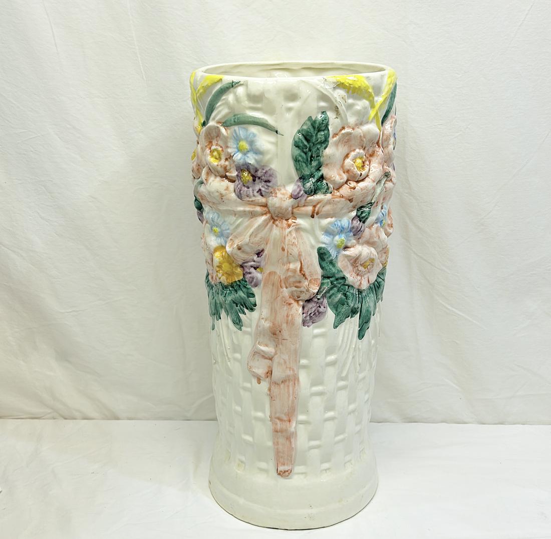 Ceramic Umbrella Stand with Pin bow & Flowers: Ceramic Umbrella Stand with Pin bow & Flowers Label on Base Made in Spain Approx. 19 in x 9 in dia,