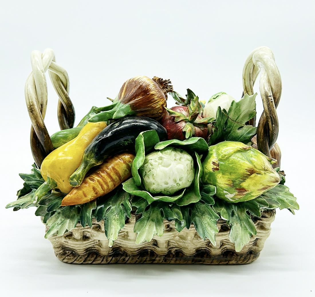 Italian vegtable basket with handles: Italian vegtable basket with handles -hand paints - signed and numbered on the bottom - A few leaf repairs - Approx 7.5 x 10 x 6.5