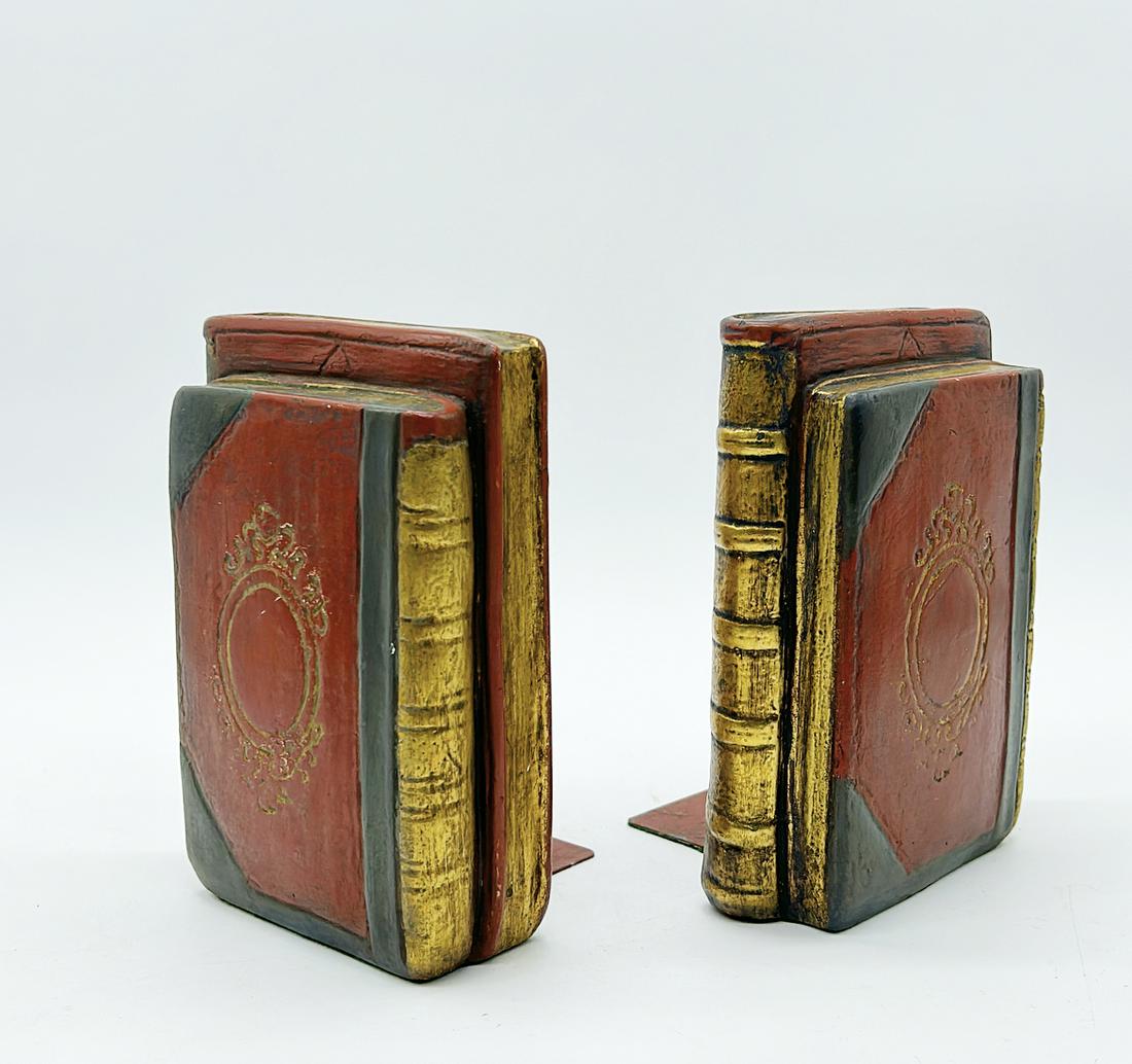 Pair of book style book ends with red gold black finish details (1 of 3)